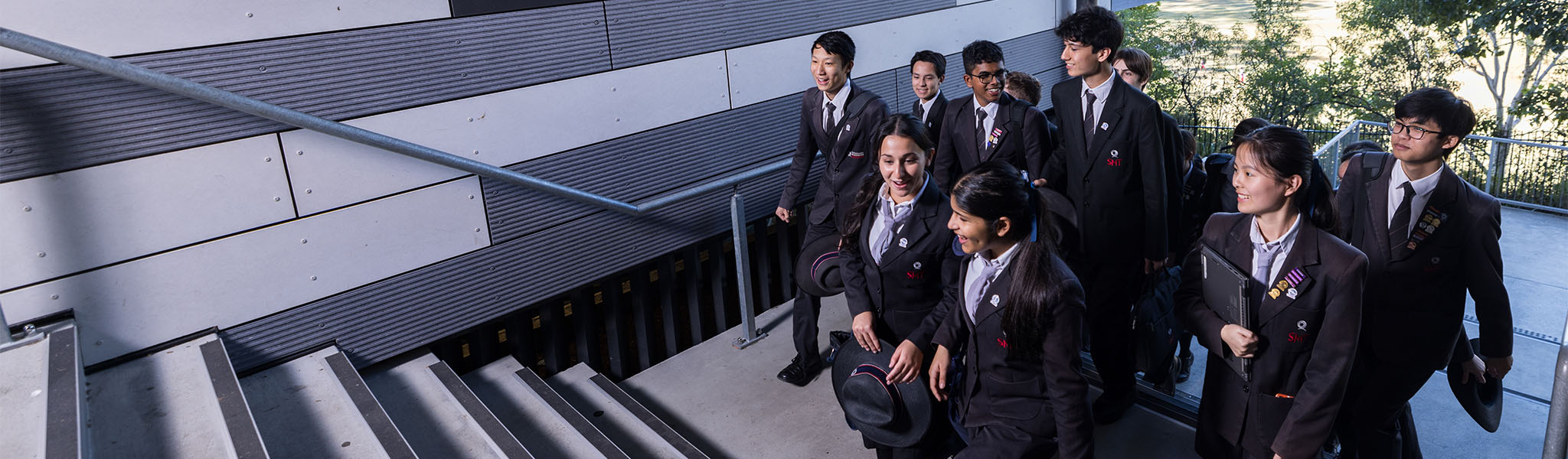 students walking along footpath